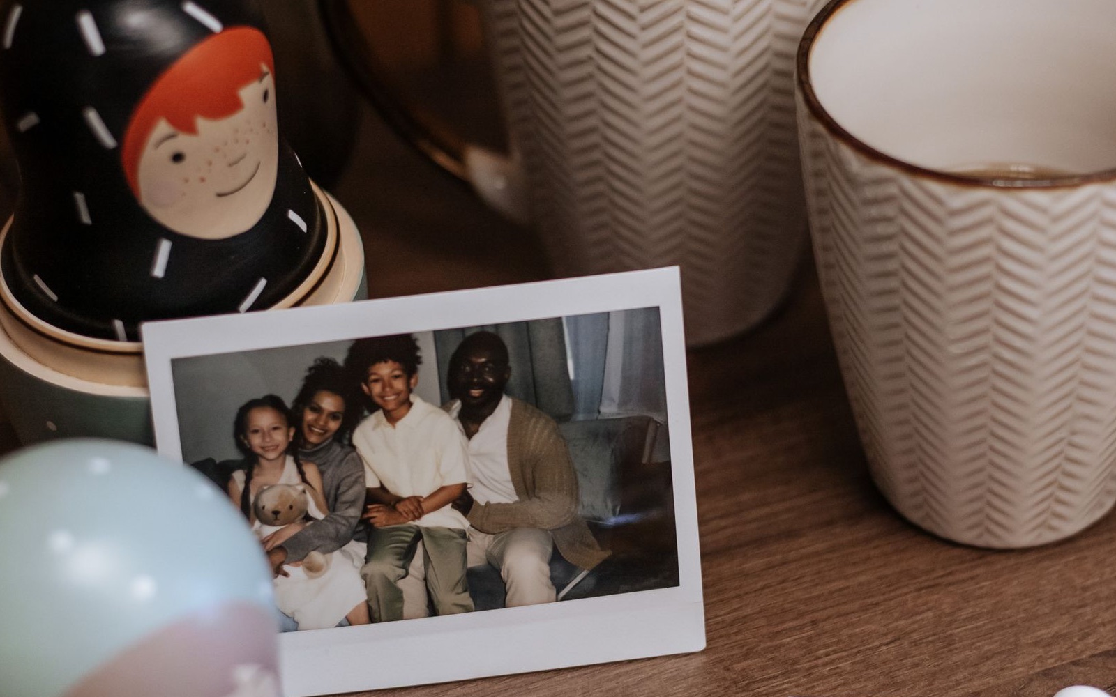 A family photograph kept among familiar objects at home